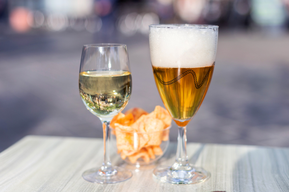 Beer and wine on a sunny terrace in Ghent, Belgium